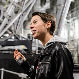 Julie Davis in the interior of the Southern Africa Large Telescope telescope