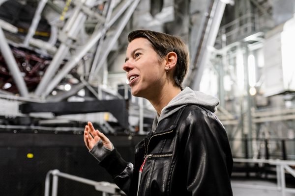 Julie Davis in the interior of the Southern Africa Large Telescope telescope
