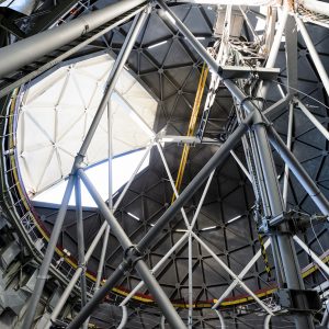 A broad view of the interior of Southern African Large Telescope, the shutter is partway open.
