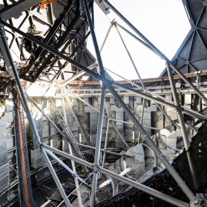 A broader view of the interior of Southern African Large Telescope, showing an open shutter with light entering.