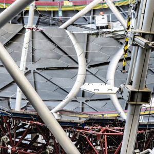 An assembly of mirrors at Southern African Large Telescope, supported by a truss at the bottom.