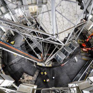 Interior shot of the Southern Africa Large Telescope from above, looking down showing a structure of struts.